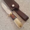 small hunting knife with olive wood and bone with surgical steel blade